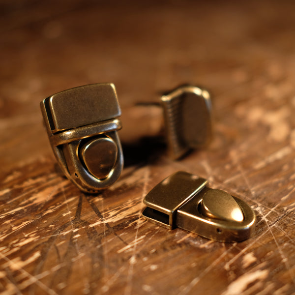 Tuck Lock - 1 1/4" Antique Brass over Zinc